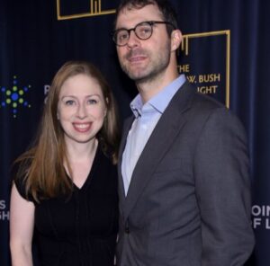 Chelsea Clinton with her husband Marc