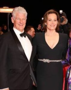 Sigourney Weaver with husband