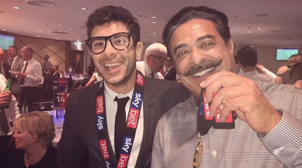 Tony Khan with his Father