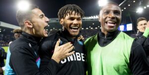 Tyrone Mings celebrating with his teammates