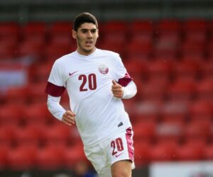 Karim Boudiaf playing for Qatar