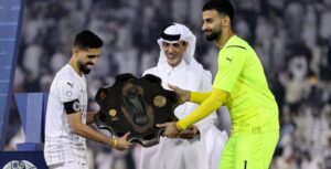 Saad Al Sheeb receiving the QSL trophy for Al Sadd SC