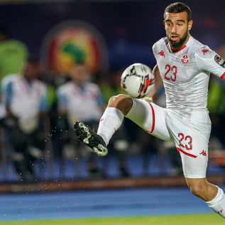 Naim Sliti playing for Tunisia