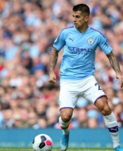 Joao Cancelo playing for Manchester City