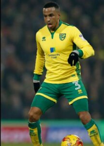 Martin Olsson playing for Norwich City