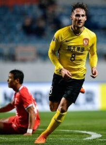 Nemanja Gudelj playing for Guangzhou Evergrande Taobao