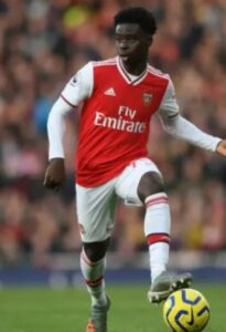 Bukayo Saka playing for Arsenal