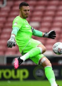 Jack Butland playing for England