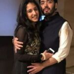 Anant Ambani with his wife